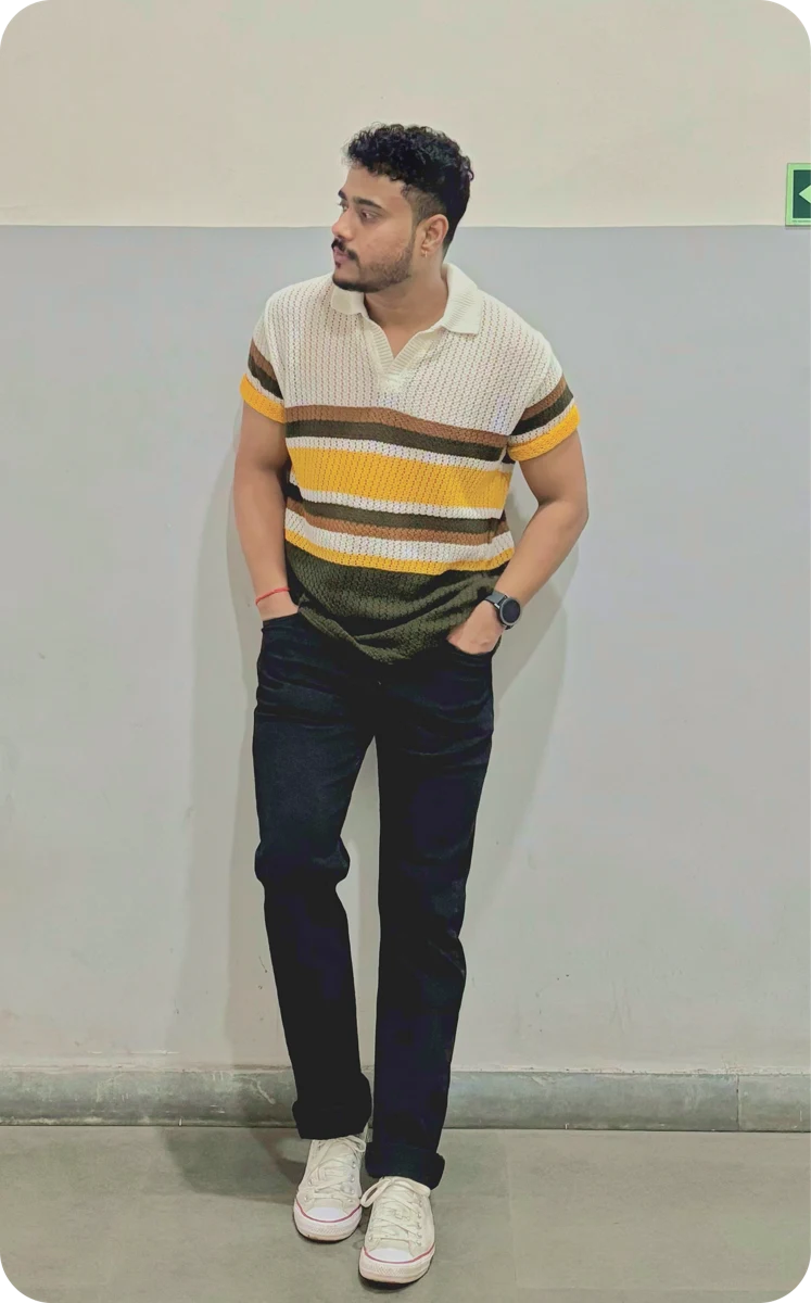 Shouvik in a striped shirt