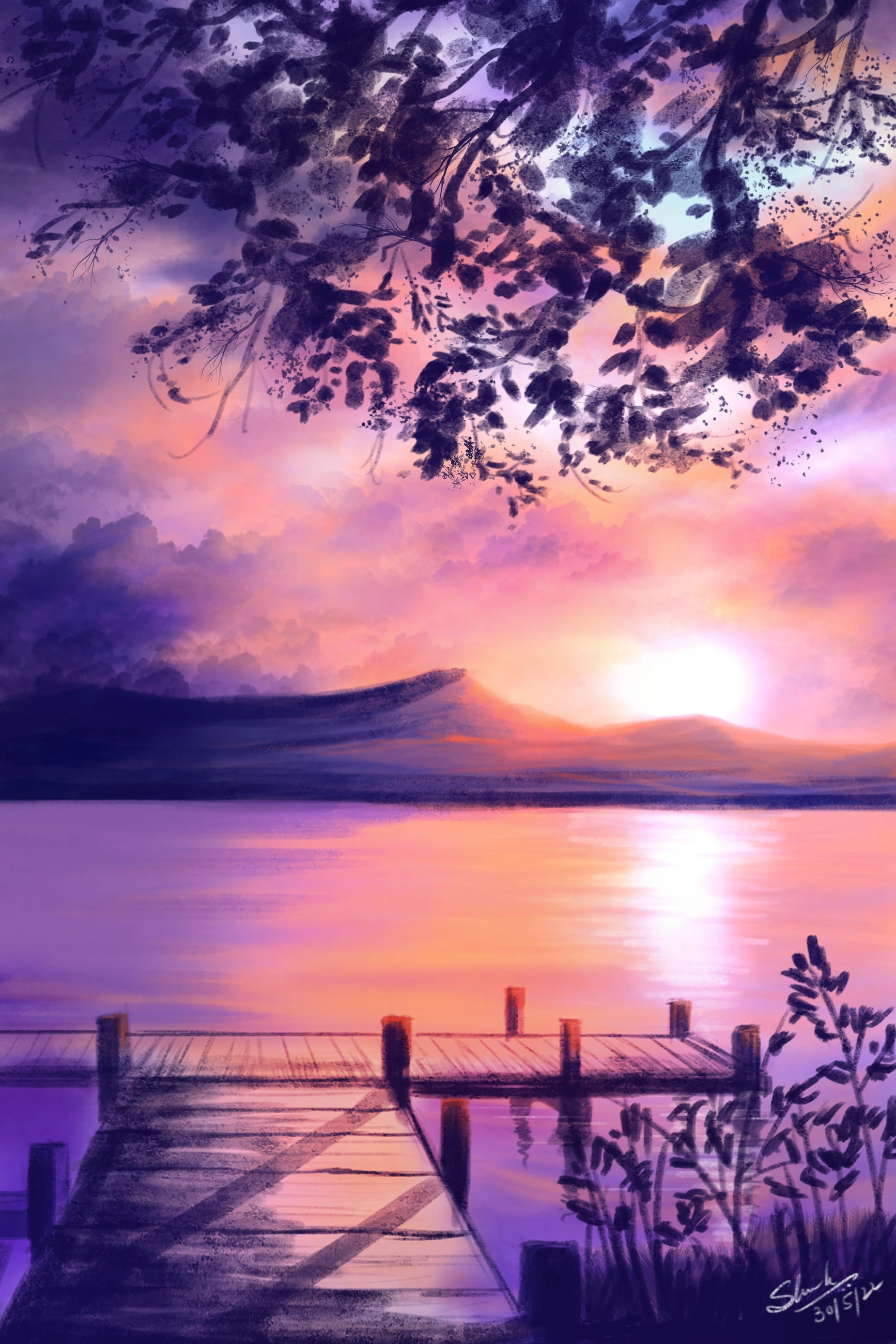 Pink sunset over a lake and jetty