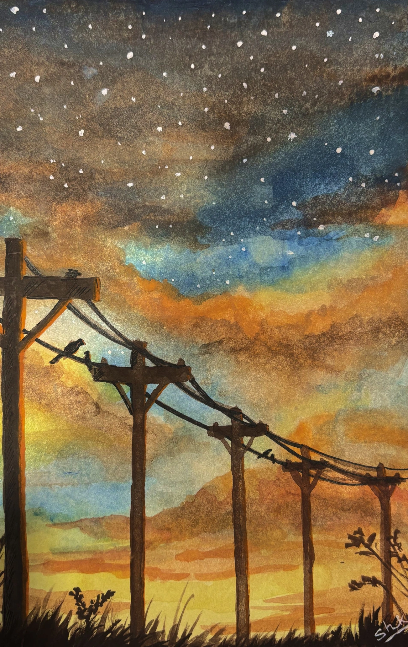 Power lines beneath a starry orange and blue sky